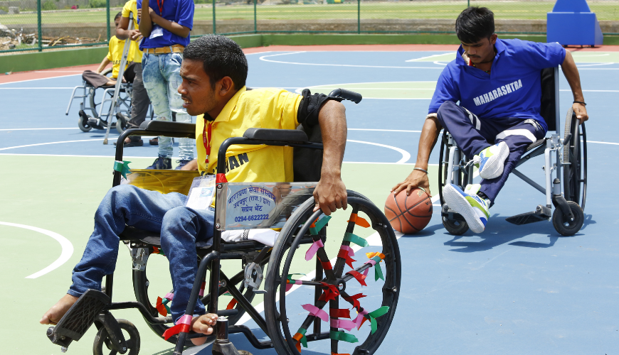 Athlete in wheelchair playing basketball Non Profit Hong Kong support
